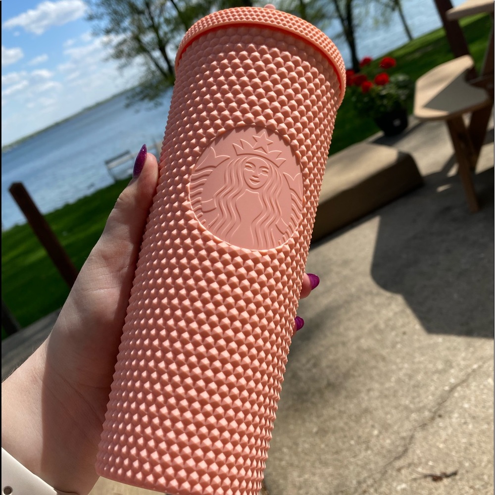 Pale pink salmon studded Starbucks tumbler Venti size